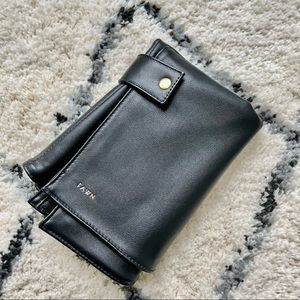 Like new Fawn Design faux leather changing mat